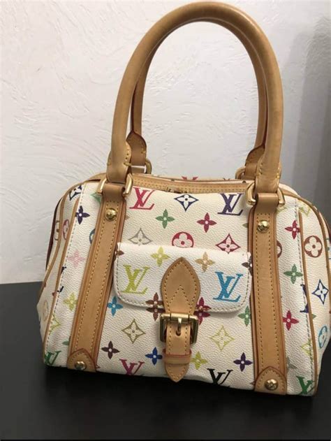 fake rainbow color louis vuitton bag with seam on bottom|louis vuitton monogram garment bag.